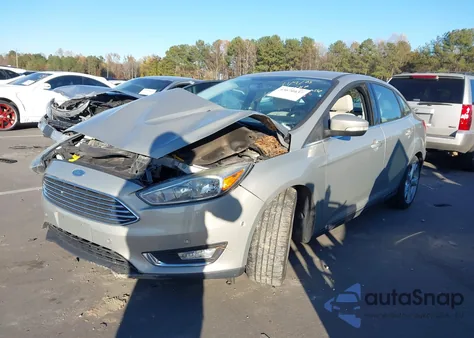2015 Ford Focus Titanium from USA, damaged, VIN 1FADP3J23FL304788